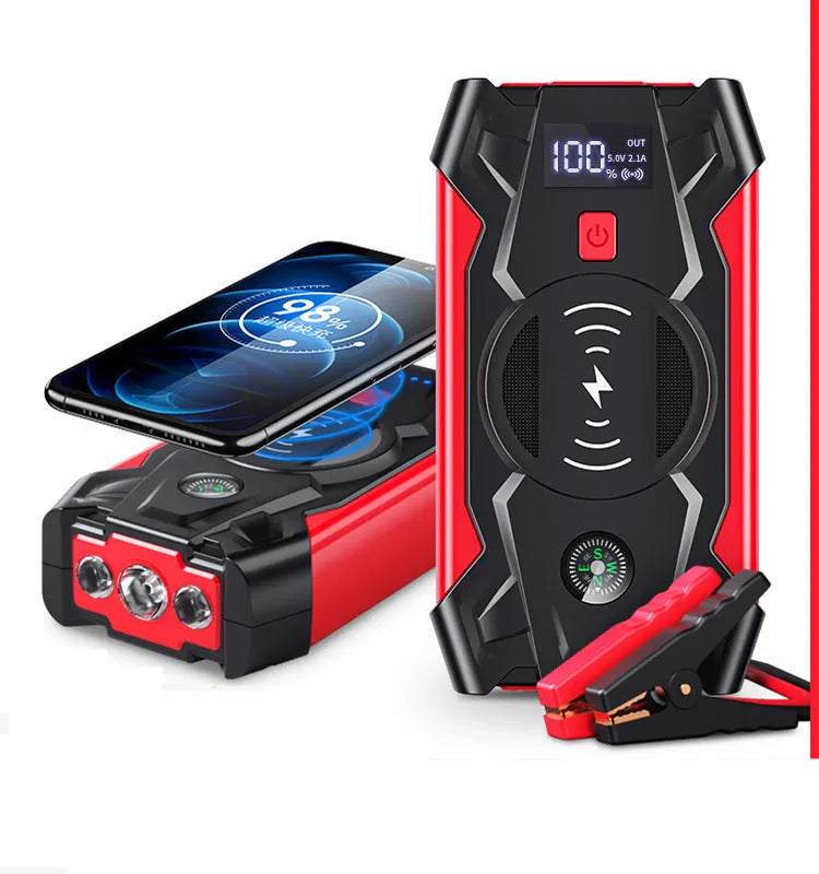 Red car emergency jump starter power pack with digital display and air pump inside a storage case.