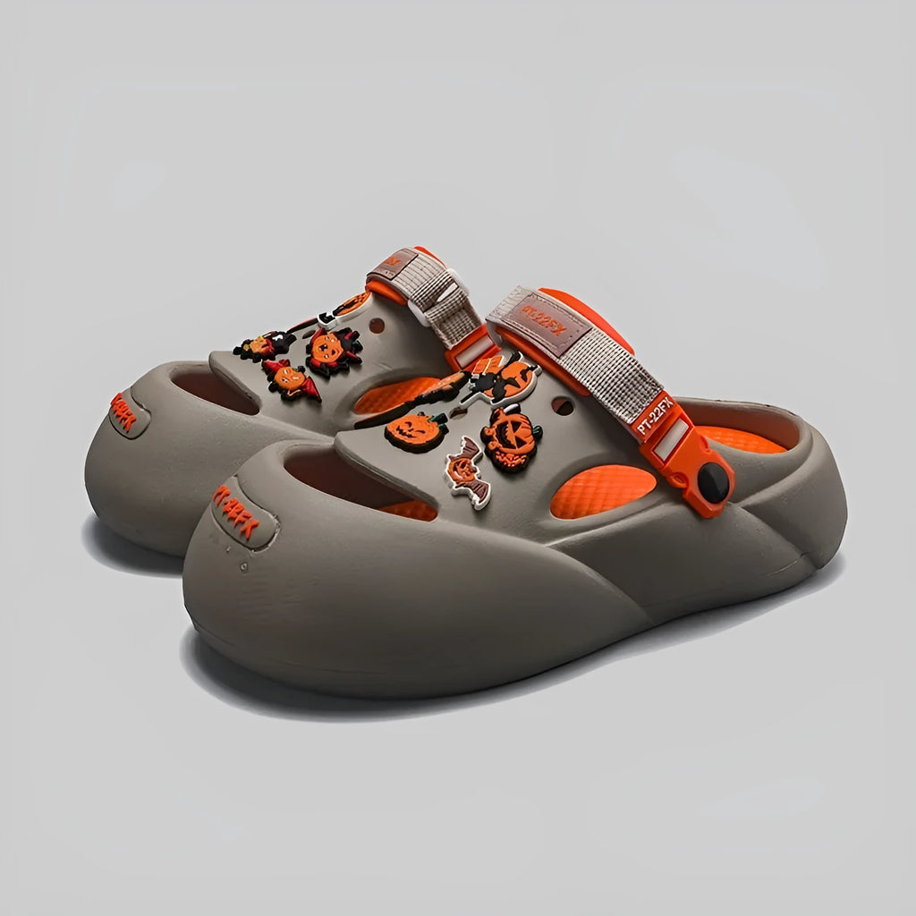 Men's grey baotou beach shoes with a soft EVA sole, shown on a sandy background.