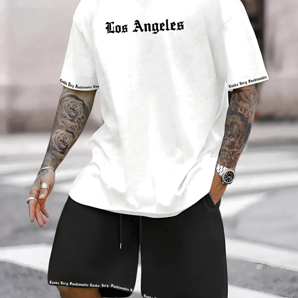 Man wearing a grey short-sleeved sports top and matching shorts from a quick-dry two-piece set.
