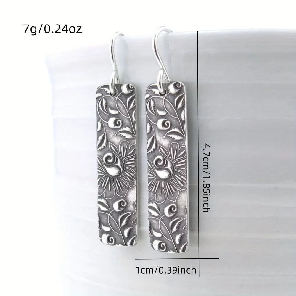 Long silver geometric earrings with carved vine design and retro European American style