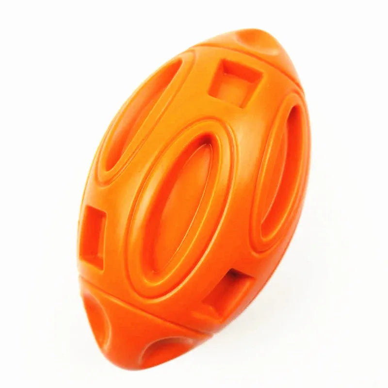 Natural rubber squeaky dog ball toy with surface grooves for medium and large breed aggressive chewers