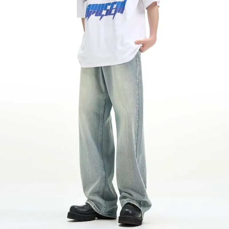 Blue retro-style loose casual trousers with an elastic waistband on a hanger.