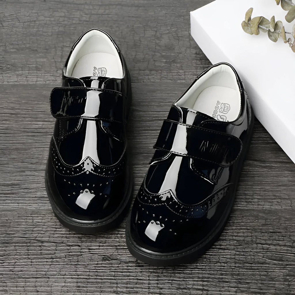 Boys black campus shoes with artificial PU upper and rubber sole, lace or Velcro fastening, sizes 26-42