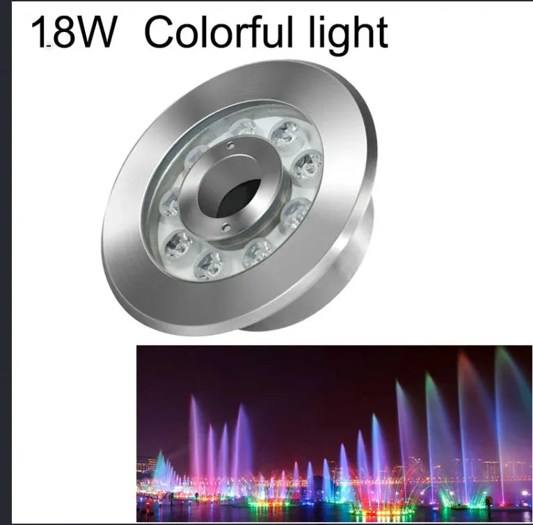 Aluminium alloy outdoor underwater lamp shown illuminated in a garden water feature.