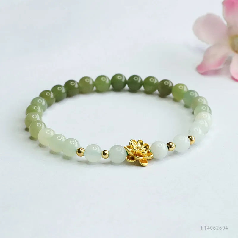 Ancient style jade bracelet with clear water gradient colour and lotus flower design