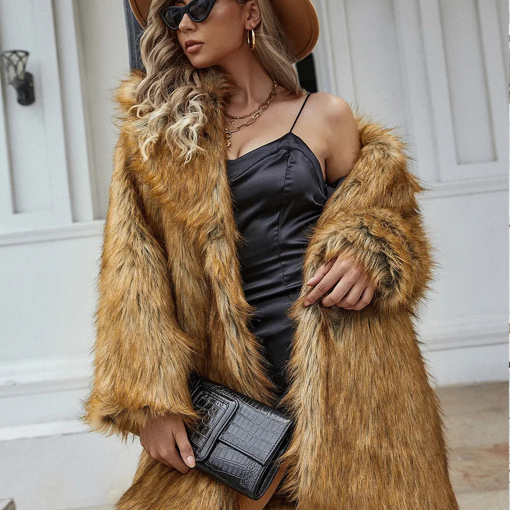 Yellow women's long faux fur coat on a hanger, showing loose fit and regular sleeves.