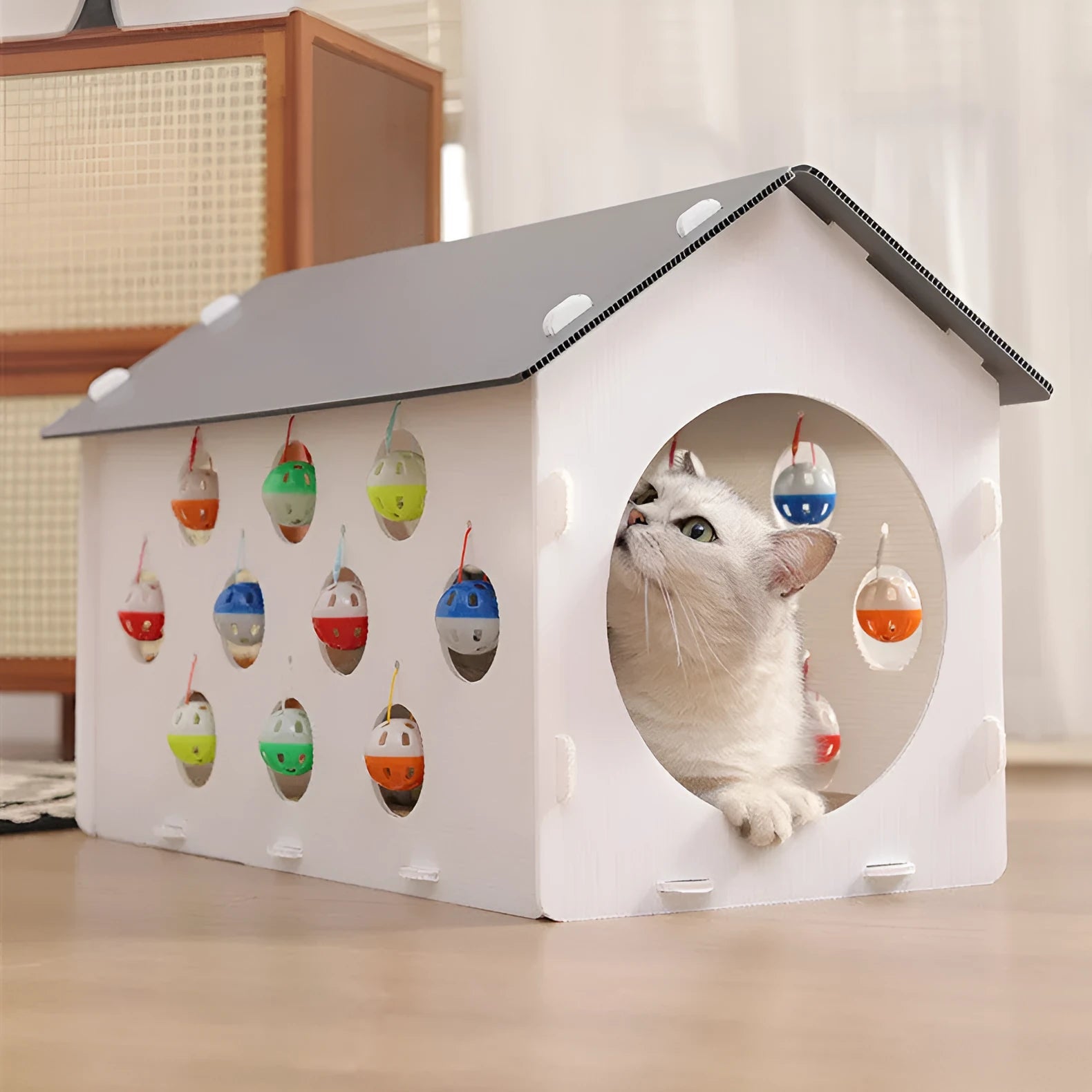 Grey and beige 3-in-1 cat activity centre with sisal scratch pad, round felt nest, and tunnel with dangling bell ball