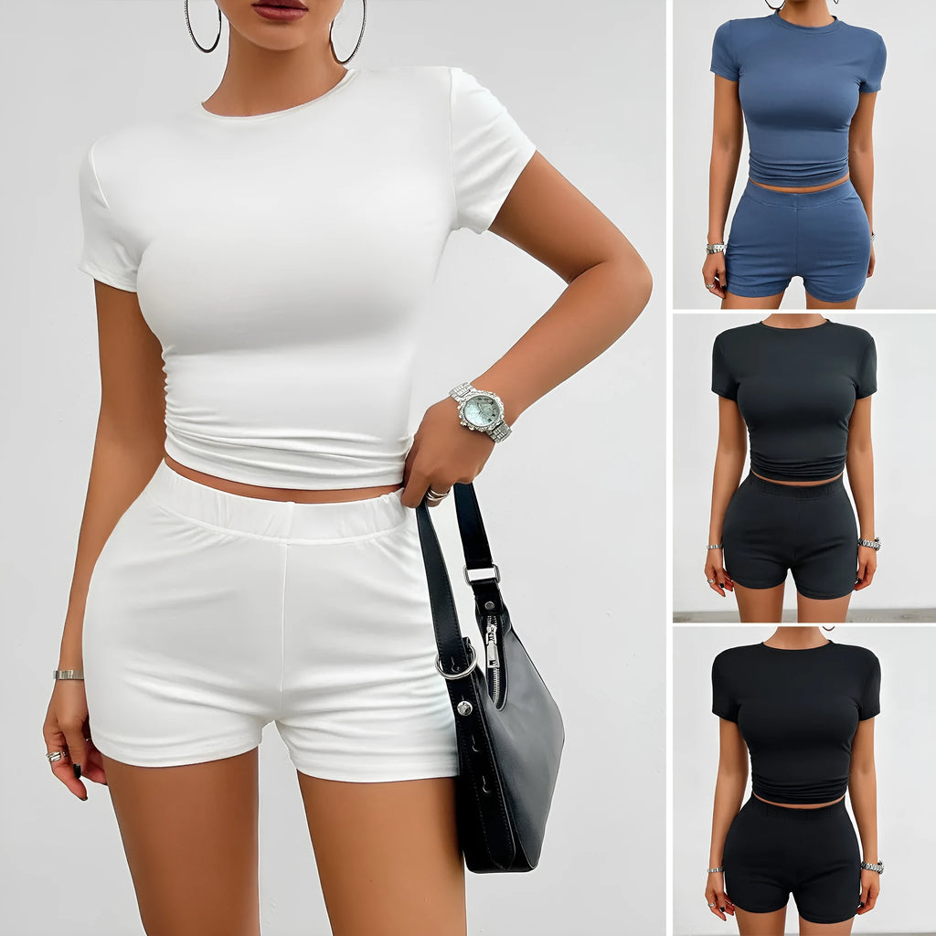 Women's solid colour viscose fibre two-piece sports set with slim-fit t-shirt and elastic shorts.