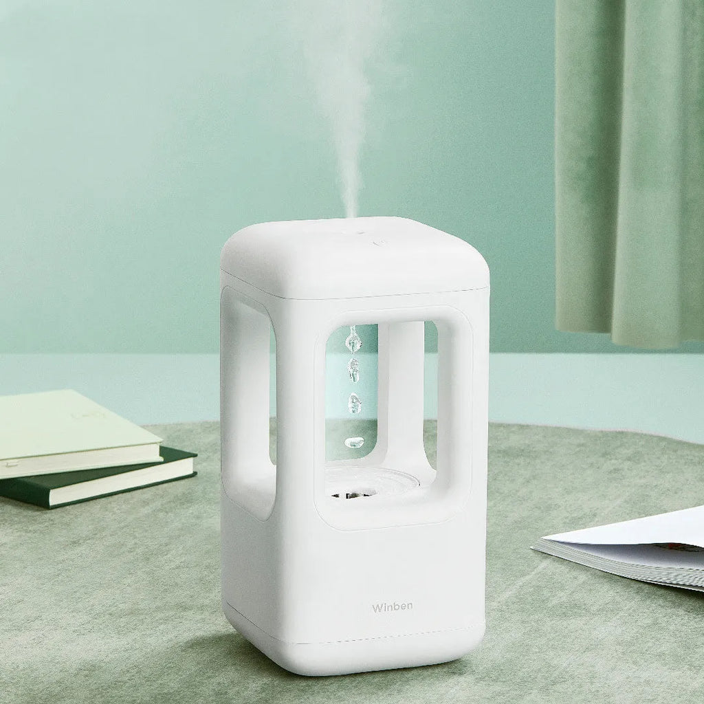Weibel anti-gravity water drop humidifier white 500ml cool mist with atmosphere light on a nightstand