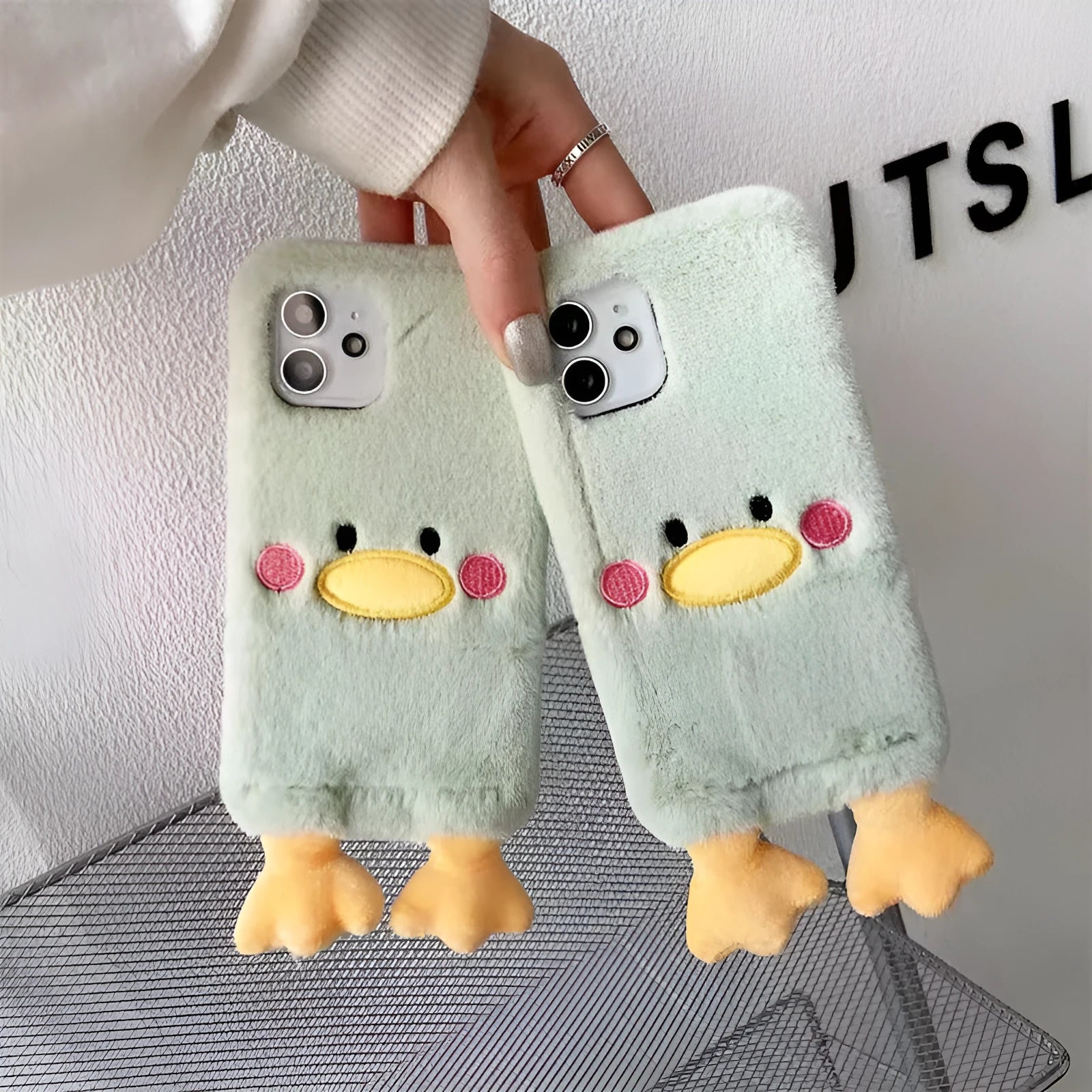 Plush duck TPU phone case for Apple iPhone 15 Pro with fall protection, back cover style, winter design