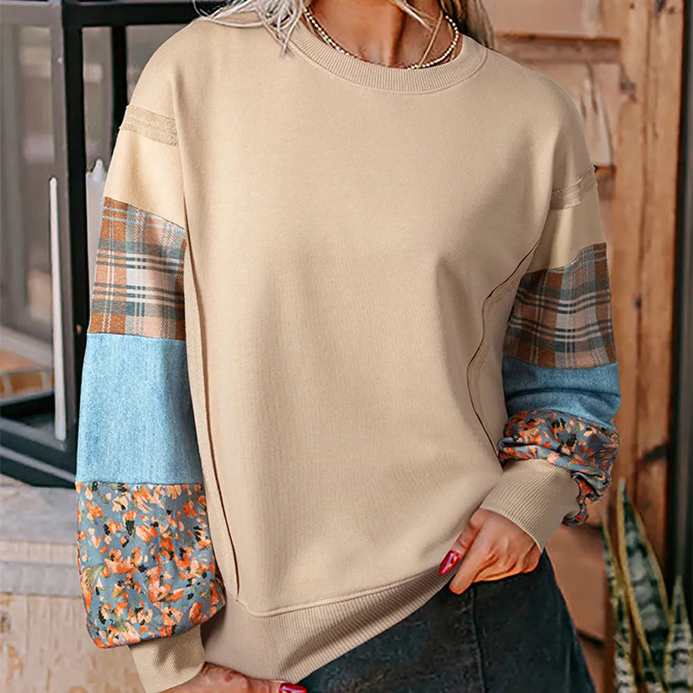 Beige and red women's loose-fit plaid long-sleeved polyester top on a hanger.