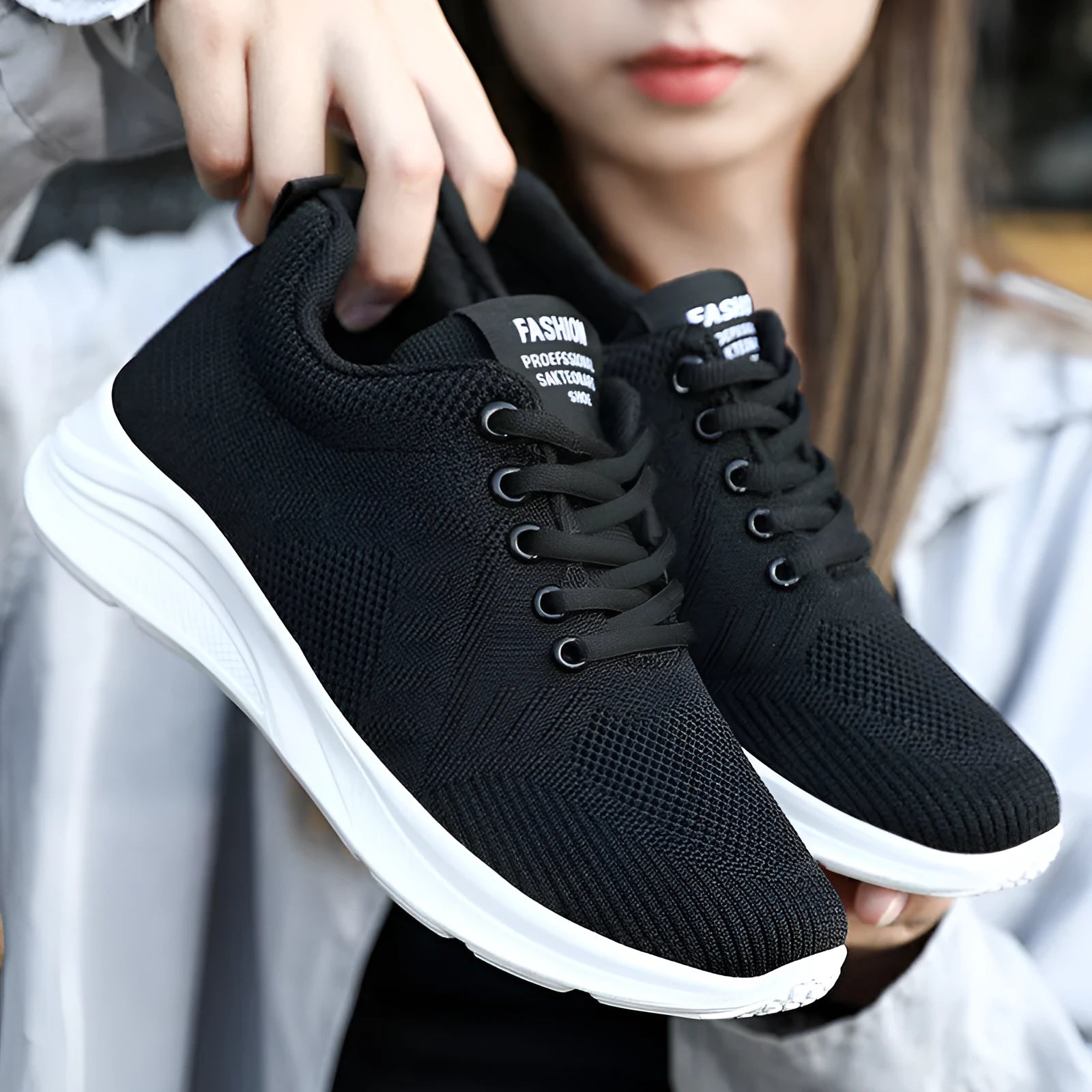 Spring Sole women's casual sports shoes in grey with mesh upper and white PVC sole on a light background