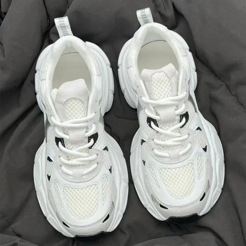 Beige mesh platform casual sports shoes with a wedge heel and front lace-up design on a rubber sole.