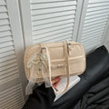PU leather single shoulder flap bag in horizontal square shape with double straps and pearl bow decoration