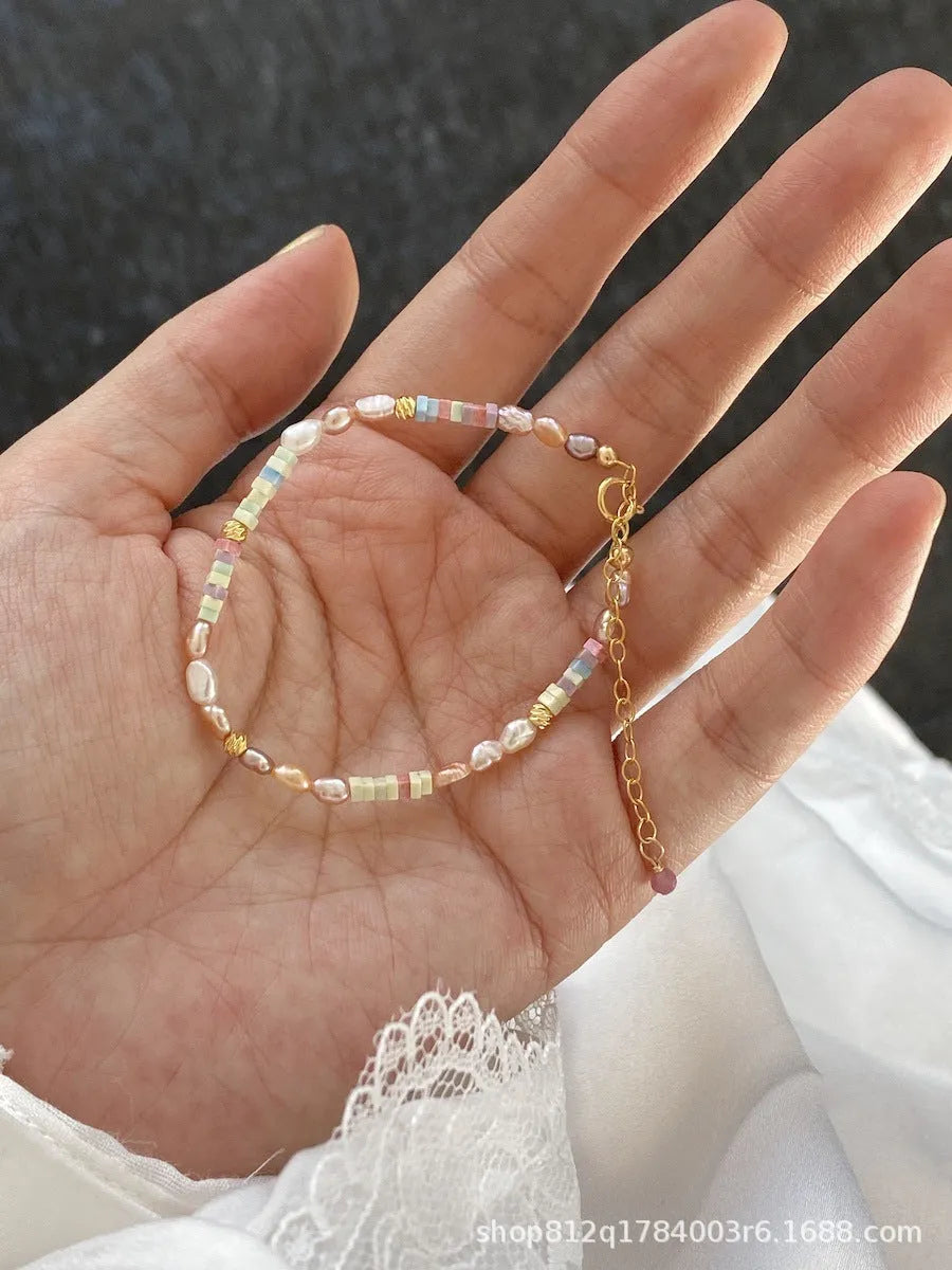 Women's natural pearl U-shaped bracelet and necklace set with 14K gilded purple silver.
