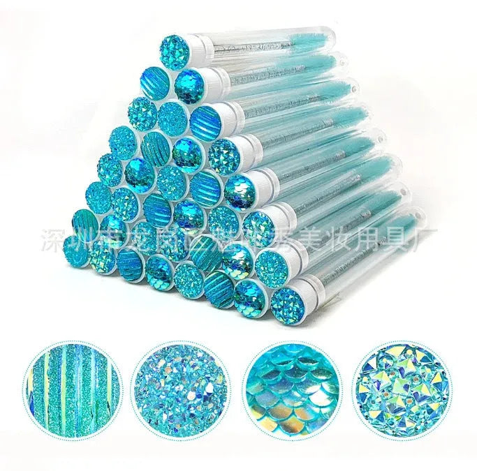 Disposable mascara brushes in transparent storage tubes for eyelash extensions and makeup.