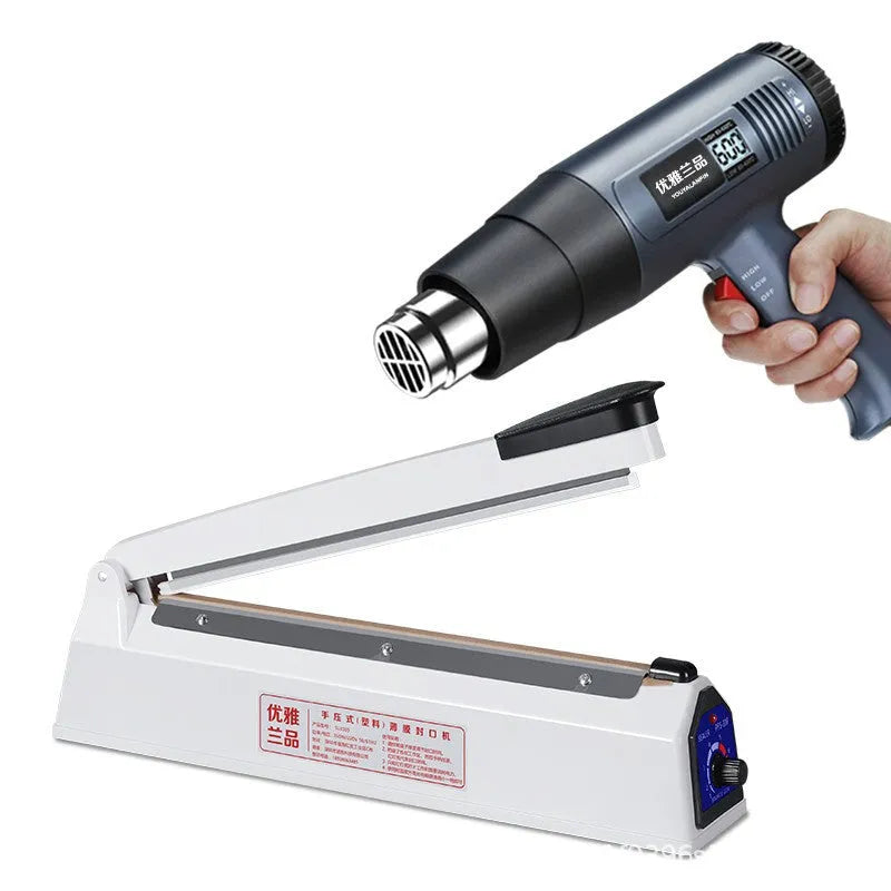 Heat film heat shrinkable bag sealing machine with 40cm sealing length and hot air gun on a workbench