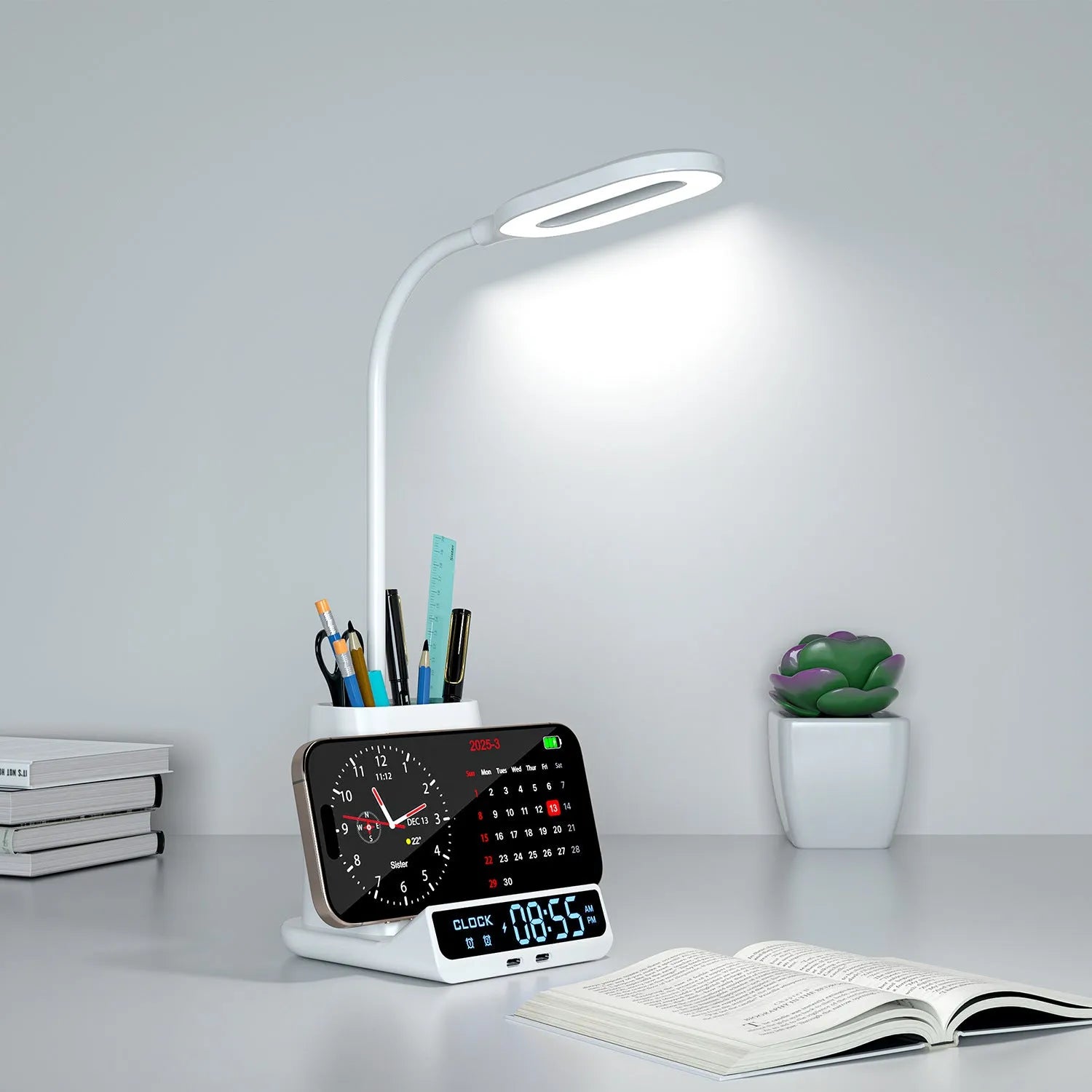 Black and white minimalist desk lamp with wireless charging pad, pen holder, and storage box.