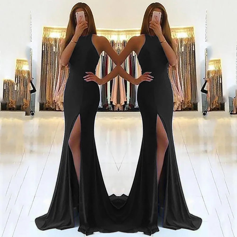 Long red ladies evening dress with large swing skirt, hanging neckline, and hollow detail on a mannequin