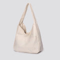 Women's soft PU leather shoulder bag in retro style with dimensions 32x12x25cm