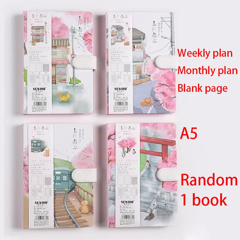 Retro style A5 handbook with full colour page illustrations and wire binding open on table