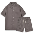 Women's casual two-piece lounge set with a plain top and elastic waist shorts in beige.