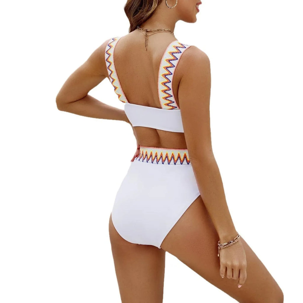 Black lace-up bikini top with high-waist bottoms on a white background.