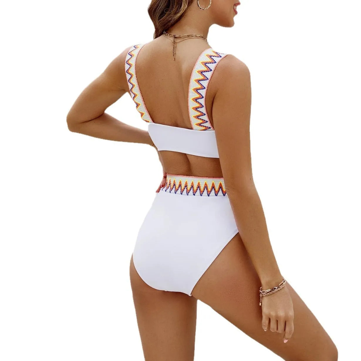 Black lace-up bikini top with high-waist bottoms on a white background.