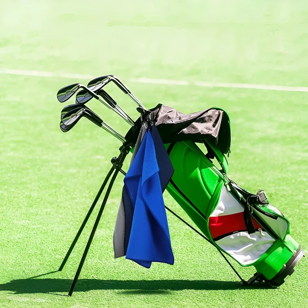 Waffle weave golf ball cleaning cloth towel in assorted colours showing textured surface.