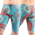 Men's green loose-fit five-point swimming trunks made from quick-drying nylon fabric.