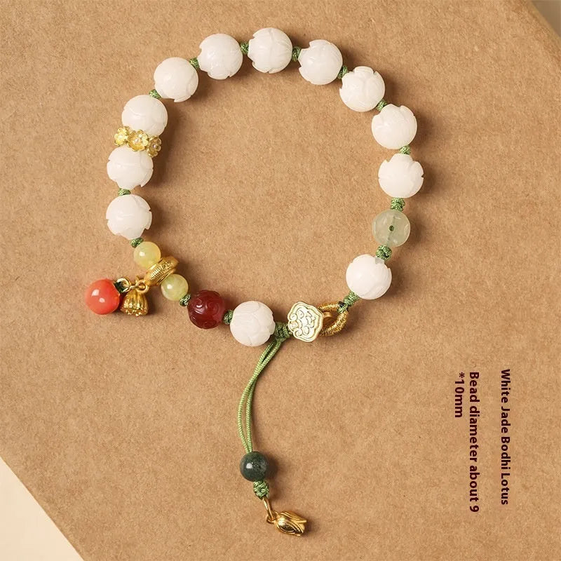Hand-woven white jade bodhi bracelet with lotus and large pumpkin beads on a single ring open rope.