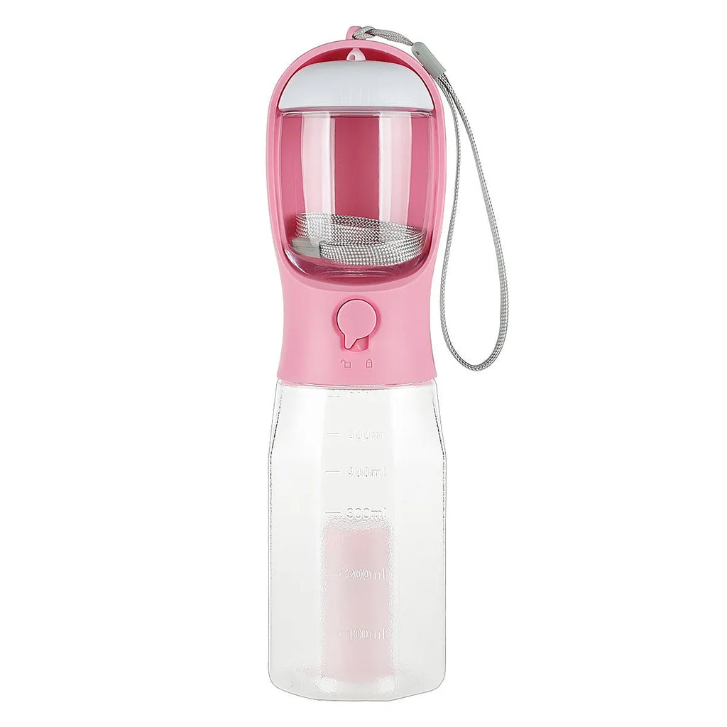 Turquoise portable 3-in-1 dog water bottle with food feeder and built-in poop bag dispenser on a walk