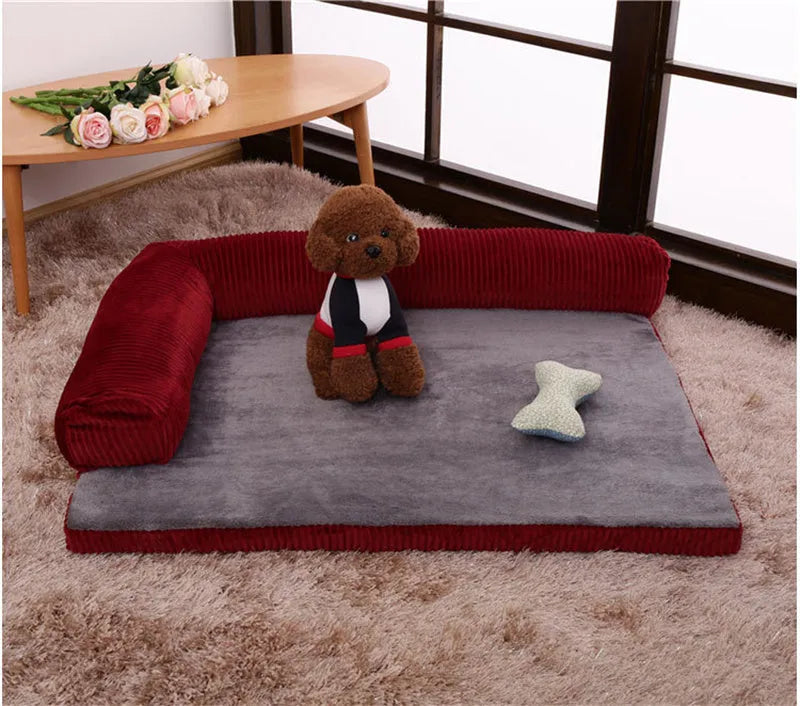 Corduroy dog sofa bed with bolster sides on a wooden floor, showing grey colour option in large size.