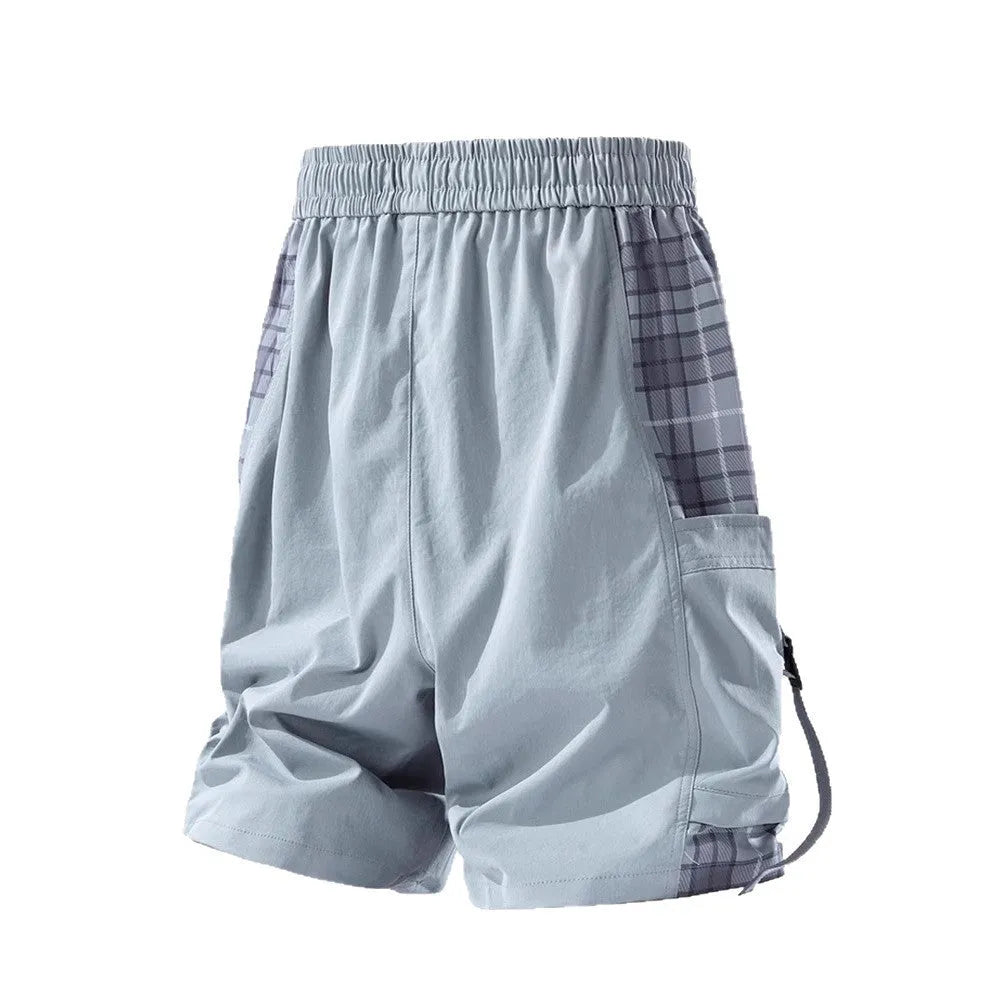 Men's black cargo shorts with plaid stitching pattern, loose fit design, and cargo pockets