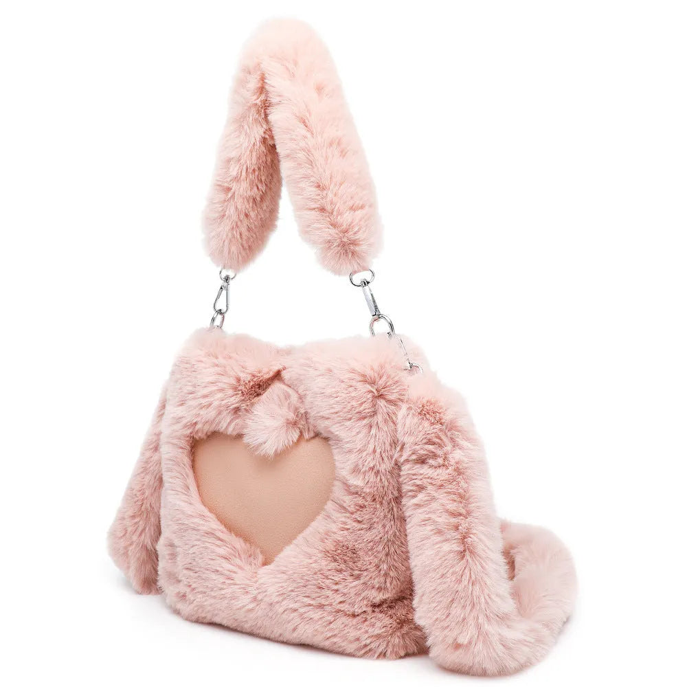 Women's fluffy plush shoulder bag in brown with detachable top handle and shoulder strap on a white background