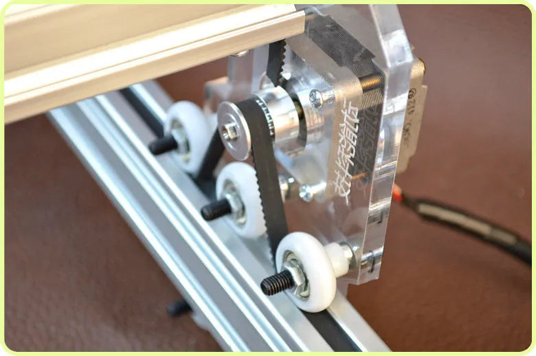 Miniature 3000mW laser engraving machine with a 400x300mm base plate for desktop marking.