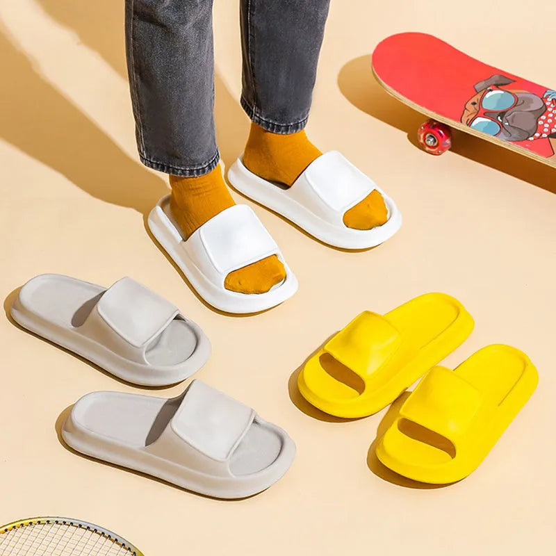 Pair of thick-soled EVA flip-flop slippers in a chosen colour on a plain background.
