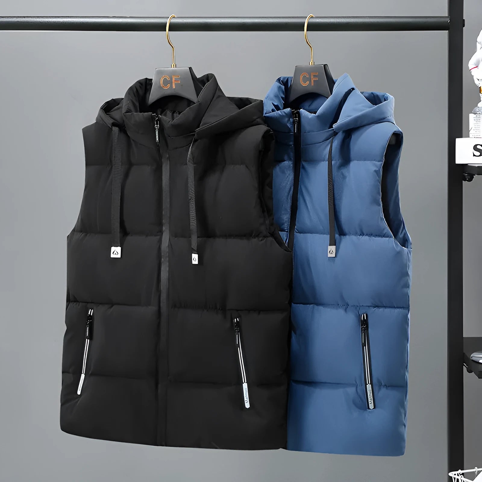Men's black thickened polyester vest with a removable hood on a hanger.