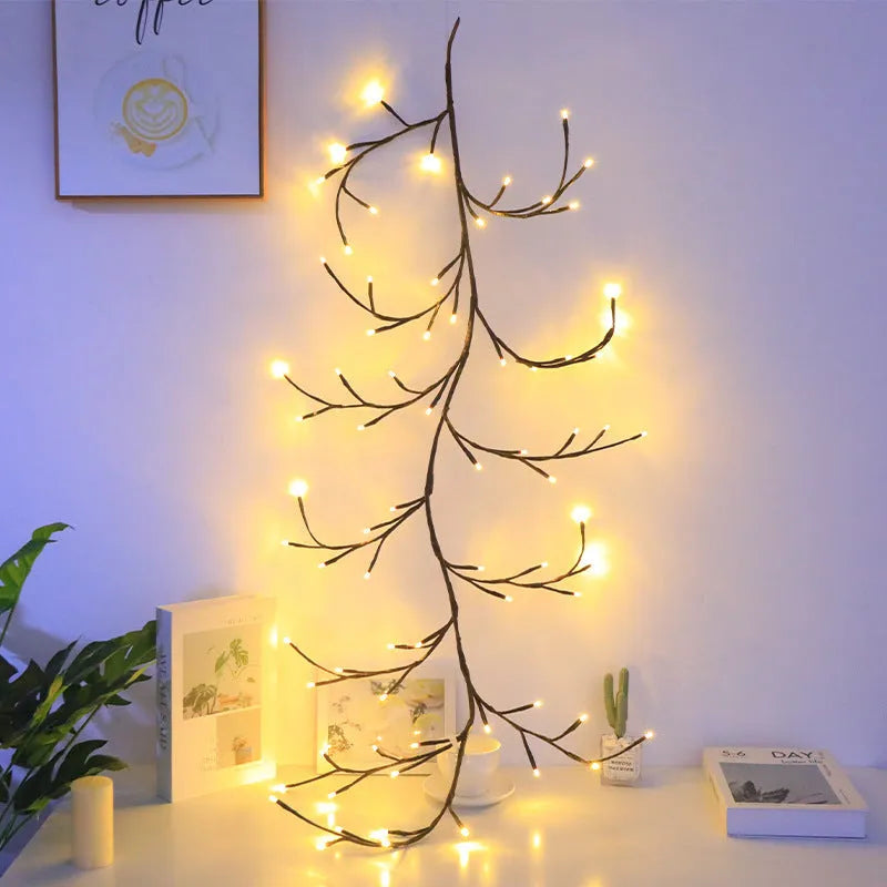 Flexible LED butterfly tree rattan lamp shaped into a decorative spiral, showing USB cable and lit white LEDs.