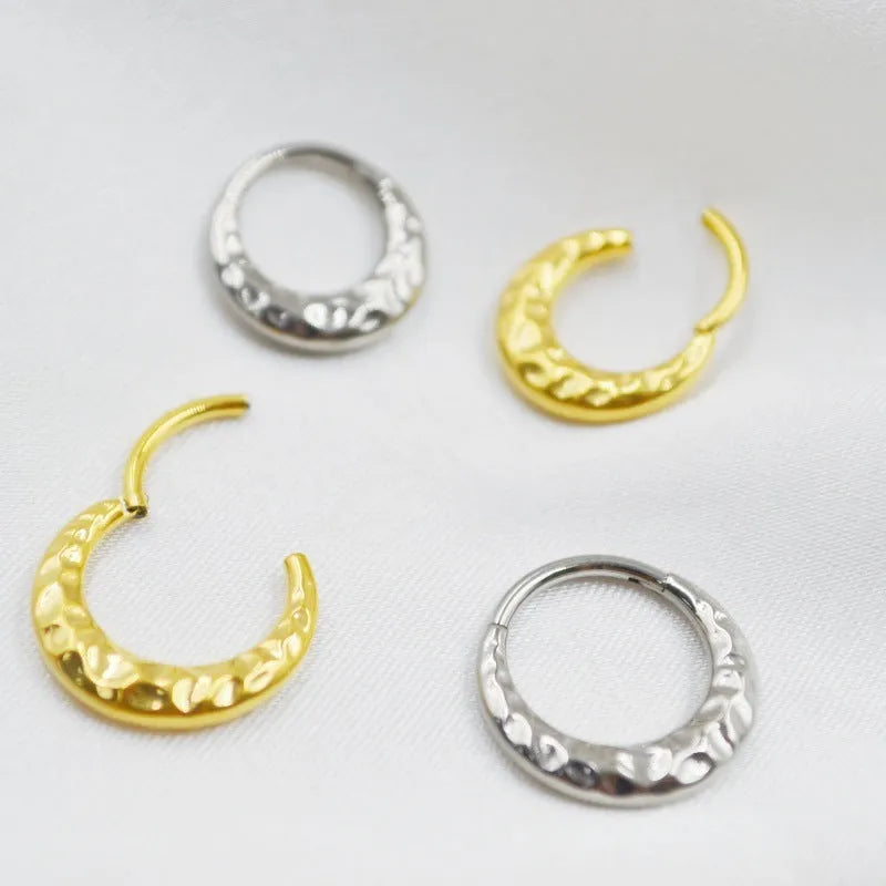 Titanium alloy concave-convex nose ring with carved surface in gold or silver colour, showing 1.2x8mm and 1.2x10mm size options