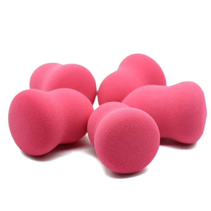 Pink makeup foundation sponge on white background showing soft texture and 4x4x5.6cm size