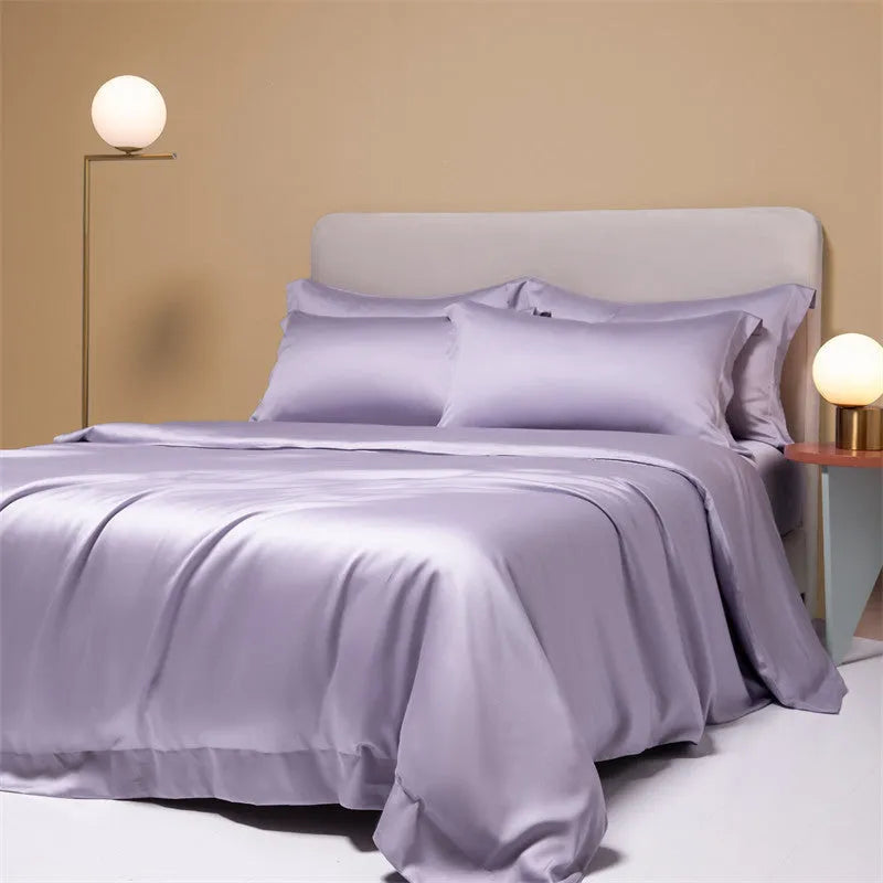 Lenzing Tencel 200 thread count bedding set in a modern colour, showing quilt cover, sheet, and pillowcases laid flat.