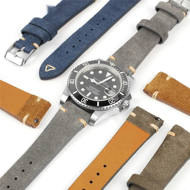 Suede genuine leather watch strap in brown, blue, grey and Army Green colours showing ethnic style detail.