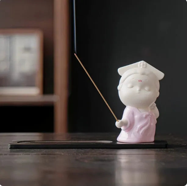 Ceramic little female court attendant figurine incense burner decoration in a floral pattern.