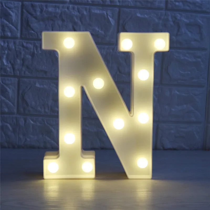 White plastic LED marquee letter sign with warm white glow, 22cm tall