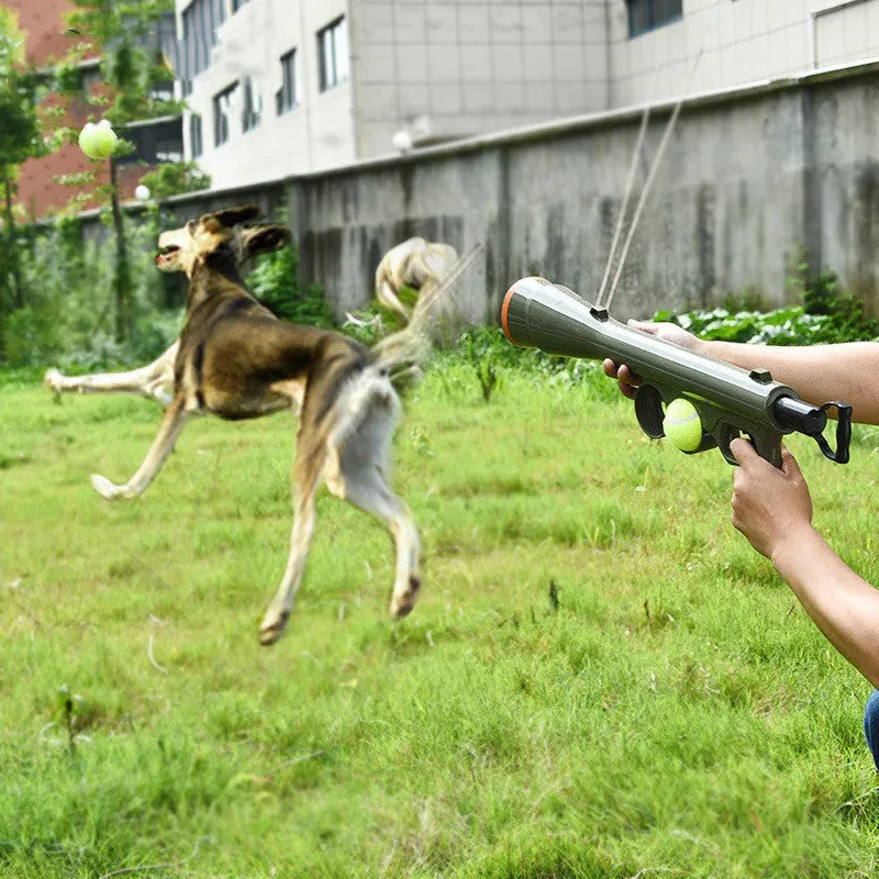 Black tennis ball shooting gun pet toy with automatic ball feeder, 65.5 cm long with two tennis balls