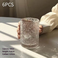 Carved begonia pattern glass water cup in solid colour showing 380ml high model and 250ml short version