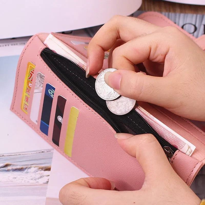 Women's long tri-fold clutch wallet in solid colour with sewing thread detail, PU leather exterior, large capacity