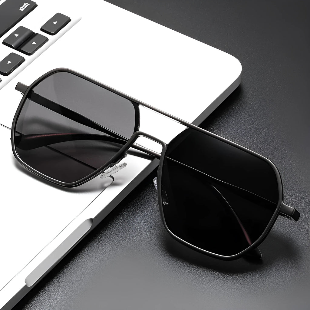 Men's polarised driving sunglasses with irregular frame in black, gold, or gunmetal colour options.