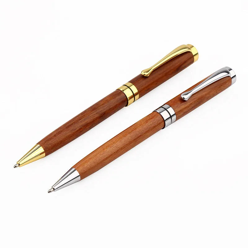 Wooden metal ballpoint pen with rosewood barrel on white background